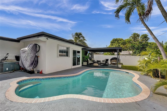 view of pool featuring a patio area and an outdoor living space