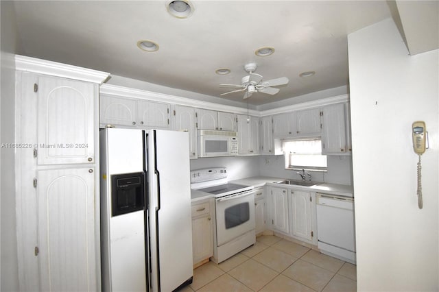 kitchen featuring light tile patterned floors, sink, white cabinets, white appliances, and ceiling fan