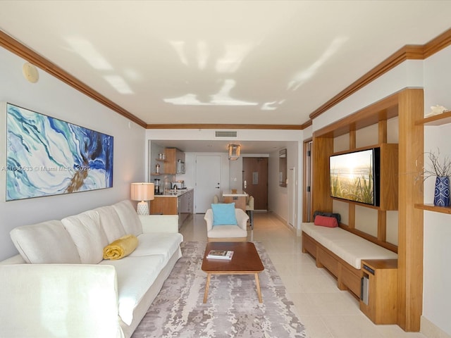 living room featuring visible vents, ornamental molding, and light tile patterned floors