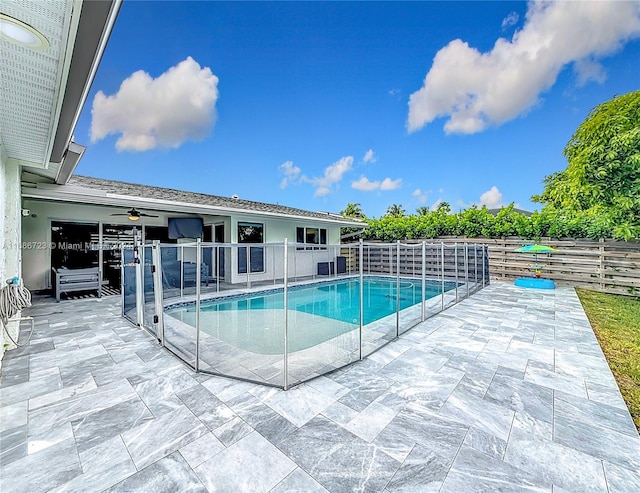 view of swimming pool featuring a patio