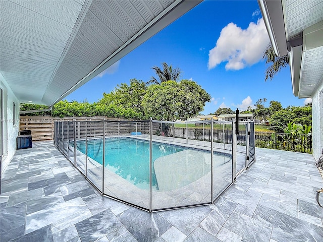 view of pool with a patio