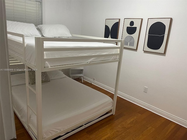 bedroom featuring wood-type flooring