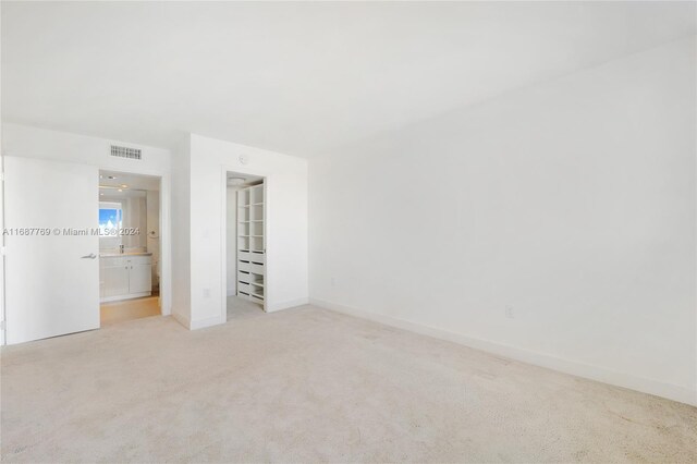 210 Sea View Dr Unit 409, Key Biscayne, FL 33149 - empty room with carpet floors and baseboards
