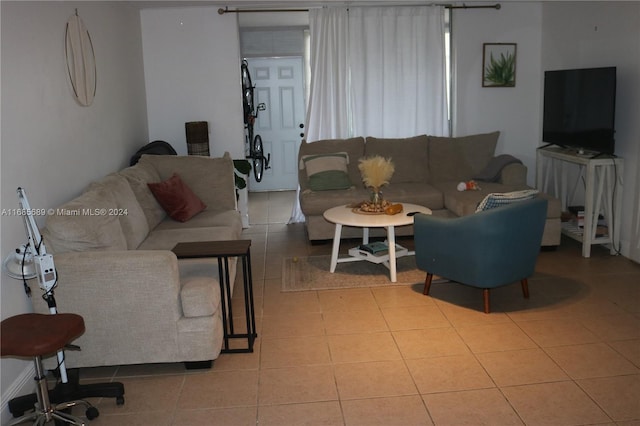 living room featuring light tile patterned floors