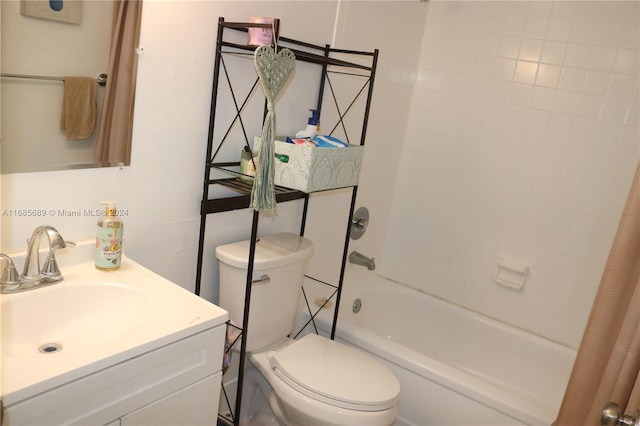 full bathroom featuring shower / bath combo, vanity, and toilet