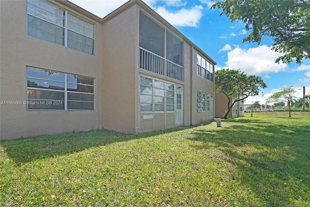 exterior space with a lawn