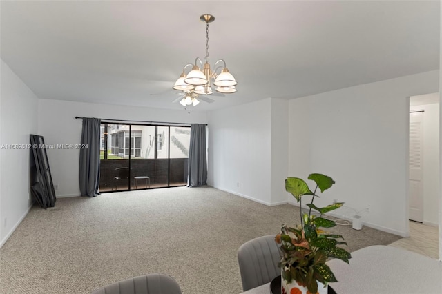 living room featuring light colored carpet and ceiling fan