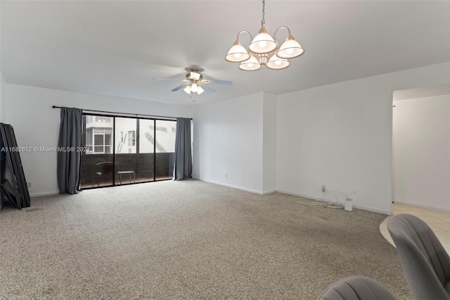 unfurnished living room with light colored carpet and ceiling fan with notable chandelier