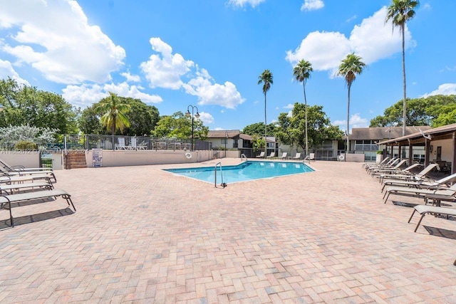 view of swimming pool featuring a patio