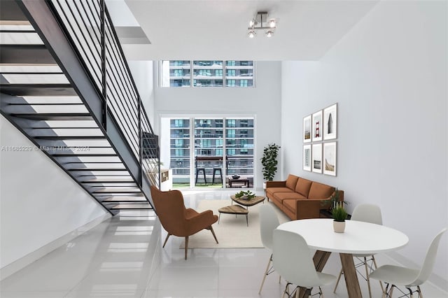 living room featuring light tile patterned flooring and plenty of natural light