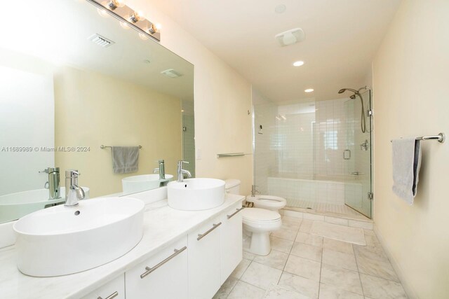 888 Biscayne Blvd Unit 4007, Miami, FL 33132 - full bath featuring a shower stall, a bidet, tile patterned flooring, recessed lighting, and double vanity
