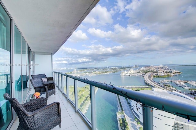 balcony featuring a water view