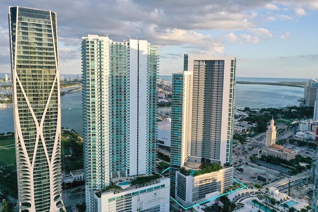 property's view of city featuring a water view