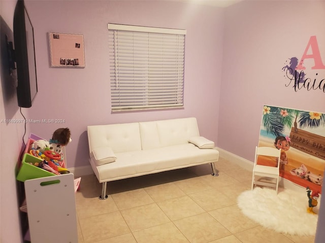 sitting room with light tile patterned floors