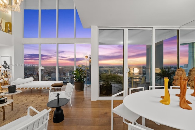 dining area featuring hardwood / wood-style floors and plenty of natural light