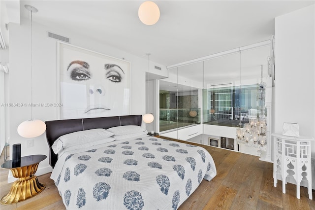 bedroom featuring hardwood / wood-style flooring