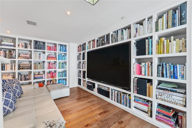 sitting room featuring hardwood / wood-style flooring