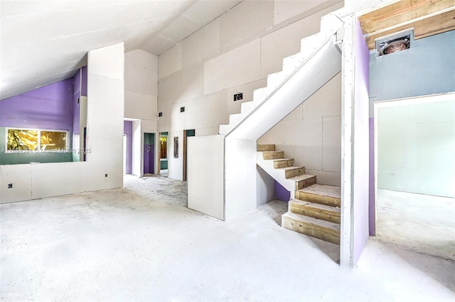 interior space featuring lofted ceiling