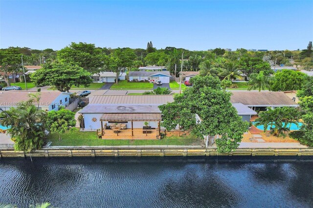 view of yard with a water view and a pergola