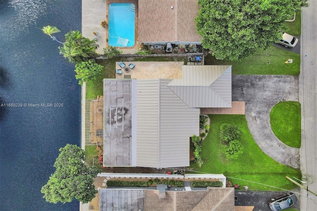 birds eye view of property featuring a water view