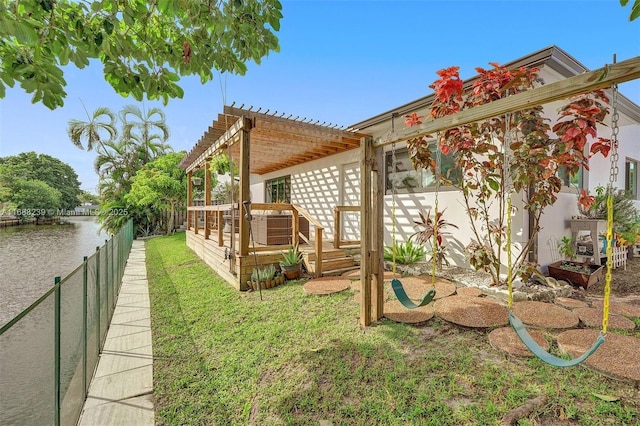 2000 NW 38th St, Oakland Park, FL 33309 - view of yard with a pergola, a water view, and central AC unit