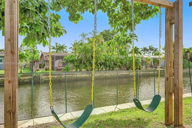 birds eye view of property featuring a water view