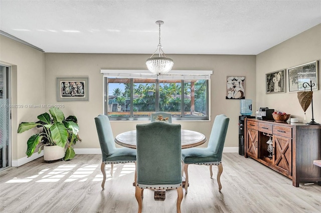 2000 NW 38th St, Oakland Park, FL 33309 - dining area with wood finished floors and baseboards