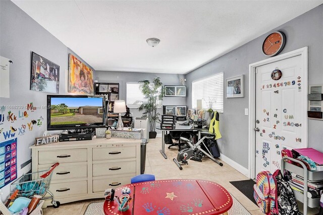 office space with light tile patterned floors