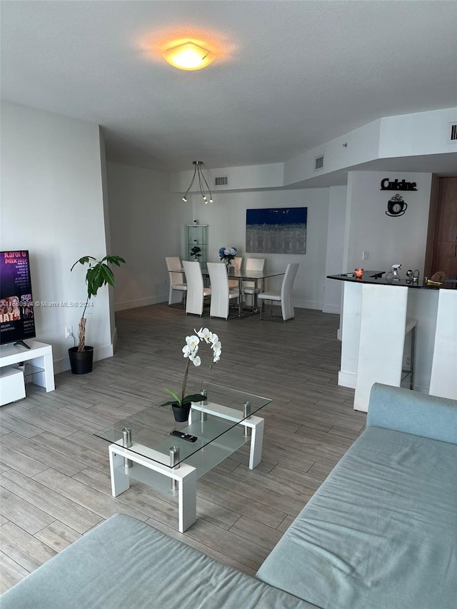 living room with wood-type flooring