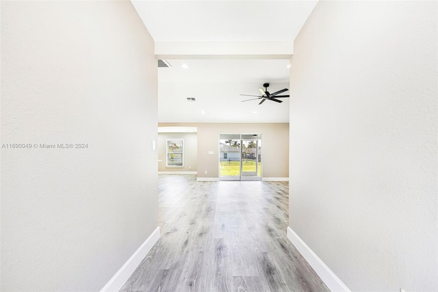 hall featuring light wood-type flooring