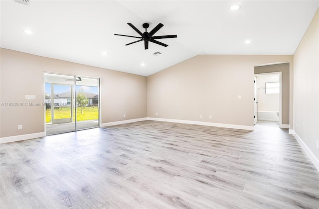 interior space with light wood-type flooring, ceiling fan, and vaulted ceiling