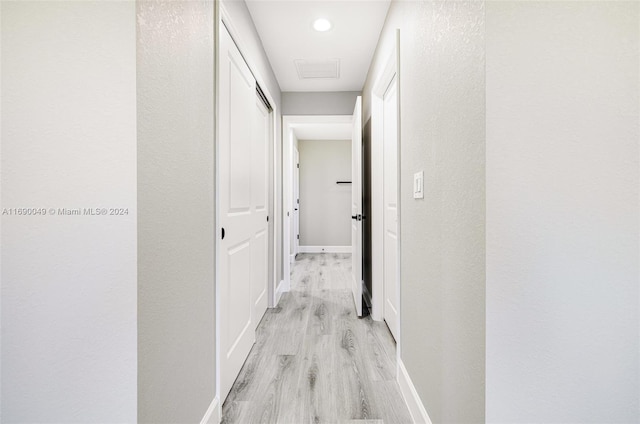 hall featuring light hardwood / wood-style floors