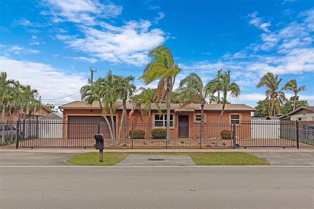 single story home with a garage