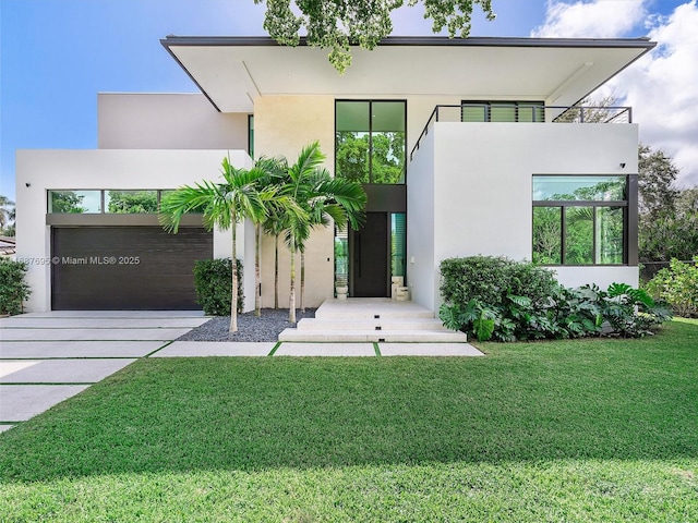 contemporary home with a front lawn