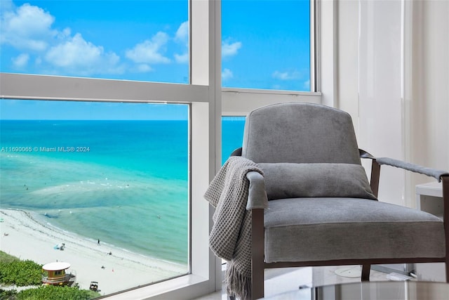 6801 Collins Ave Unit 1215, Miami Beach, FL 33141 - sitting room featuring view of water and beach