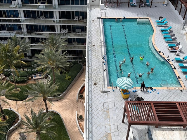 view of pool featuring a patio