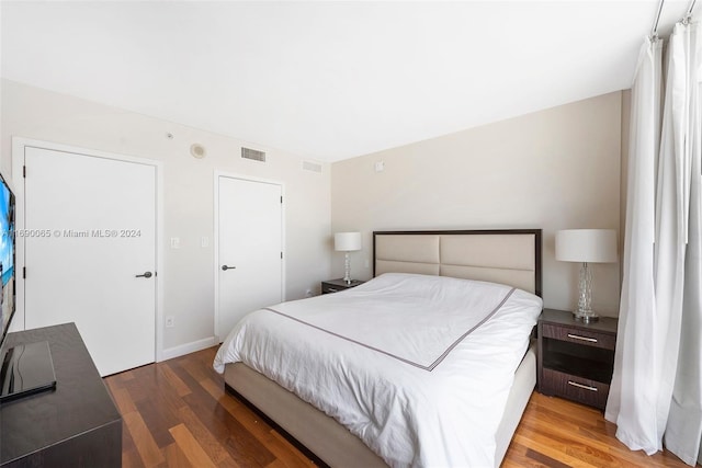 bedroom featuring hardwood / wood-style flooring