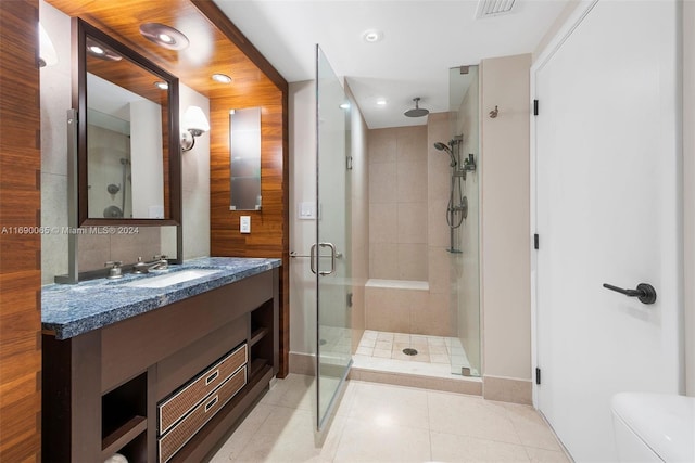 6801 Collins Ave Unit 1215, Miami Beach, FL 33141 - full bathroom featuring a stall shower, vanity, tile patterned floors, and recessed lighting