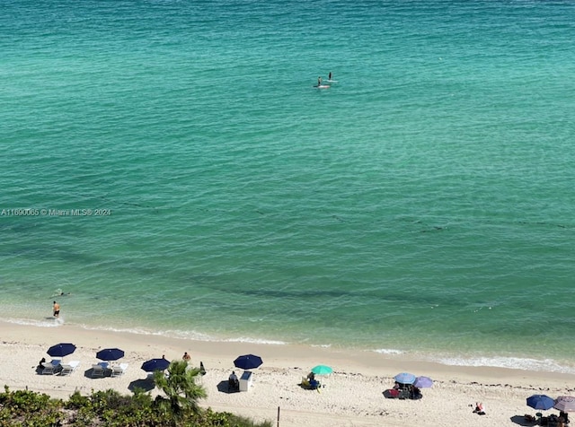 view of water feature with a beach view