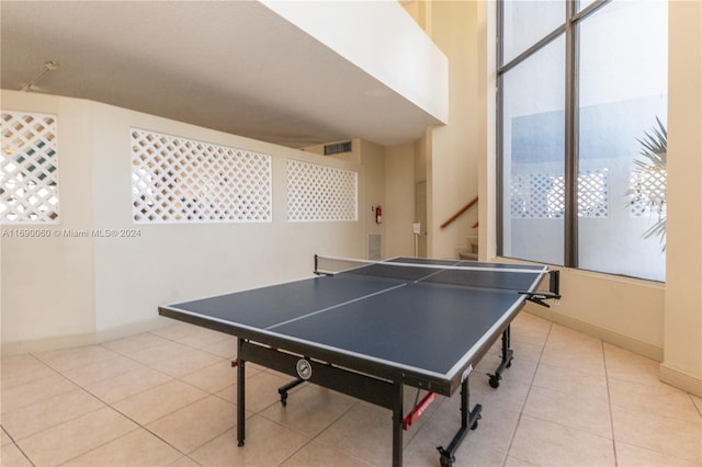 recreation room with tile patterned floors