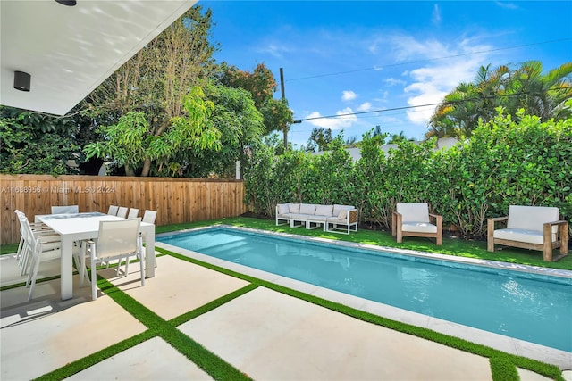 view of pool with a patio