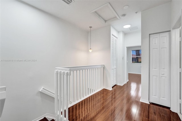 hallway featuring hardwood / wood-style flooring