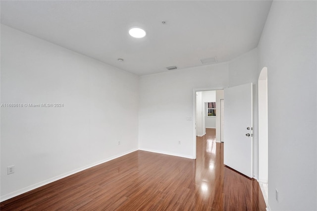 empty room featuring hardwood / wood-style floors