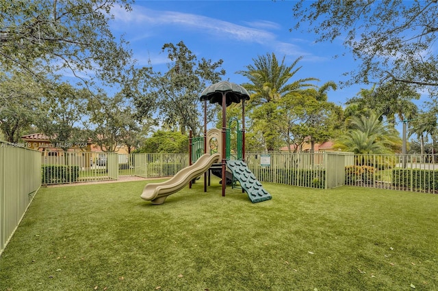 view of jungle gym featuring a yard