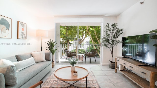 living room with light tile patterned floors