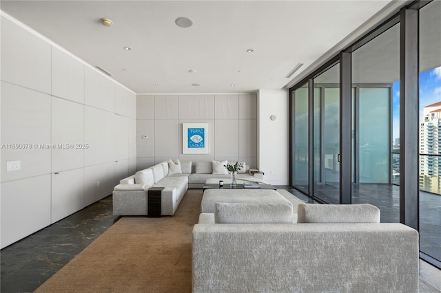 living room with floor to ceiling windows