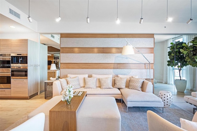 living room with light wood-type flooring