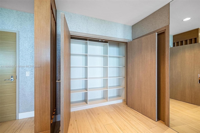 hallway featuring light hardwood / wood-style flooring