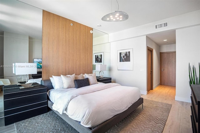 bedroom featuring light hardwood / wood-style flooring