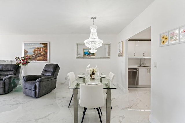 dining space featuring sink and a notable chandelier